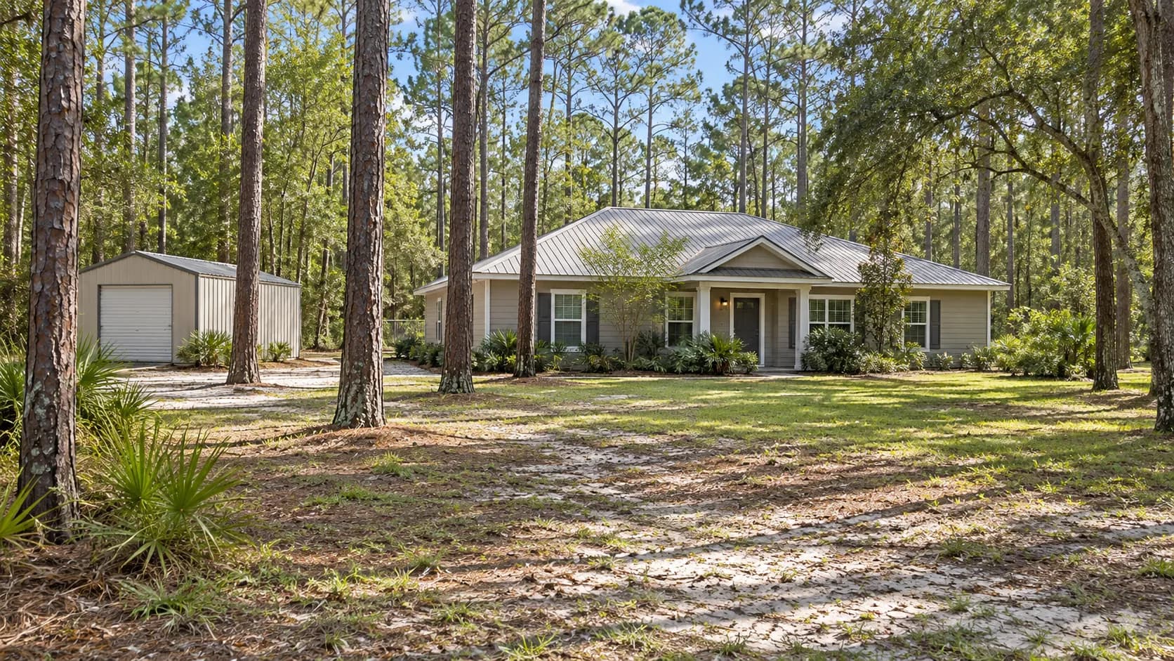 Middleburg home on a large wooded lot with a metal shed and tall pine trees